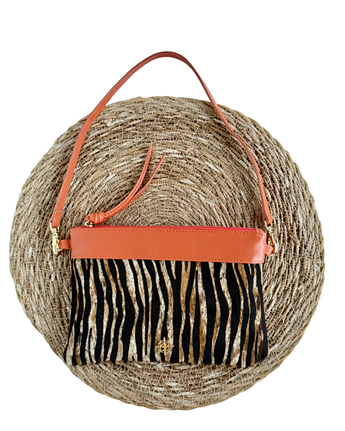Bolsa Clutch Greta Pêlo Zebra / Aperol
