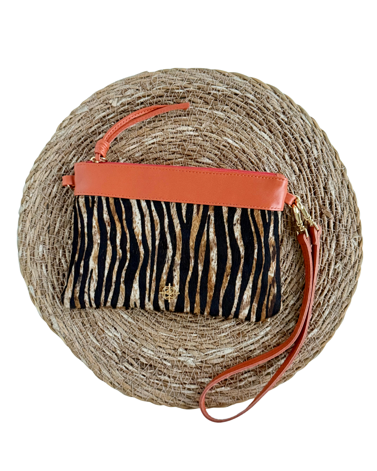 Bolsa Clutch Greta Pêlo Zebra / Aperol